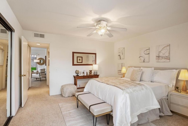 carpeted bedroom with ceiling fan