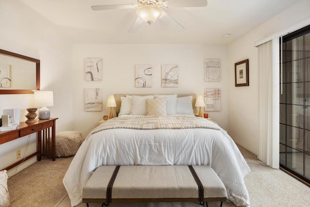 bedroom featuring ceiling fan and light carpet