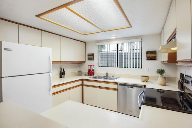 kitchen with sink, white cabinetry, and appliances with stainless steel finishes