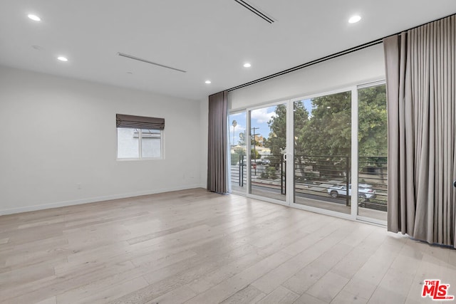 empty room featuring light hardwood / wood-style floors