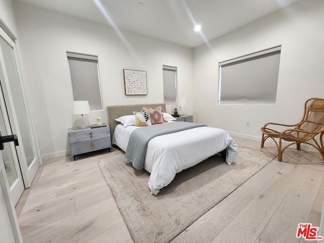 bedroom featuring light hardwood / wood-style floors