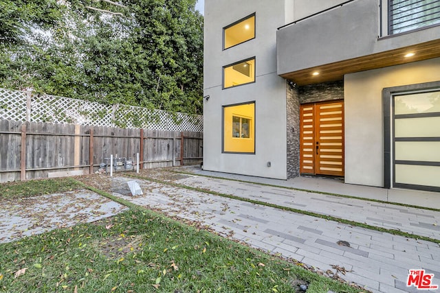 exterior space with a patio area