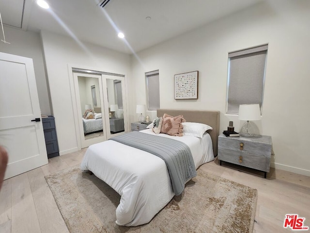 bedroom featuring light hardwood / wood-style floors