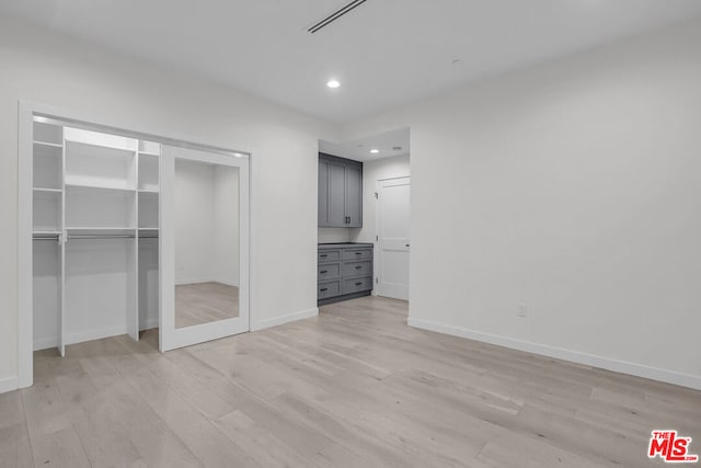 unfurnished bedroom featuring light hardwood / wood-style floors