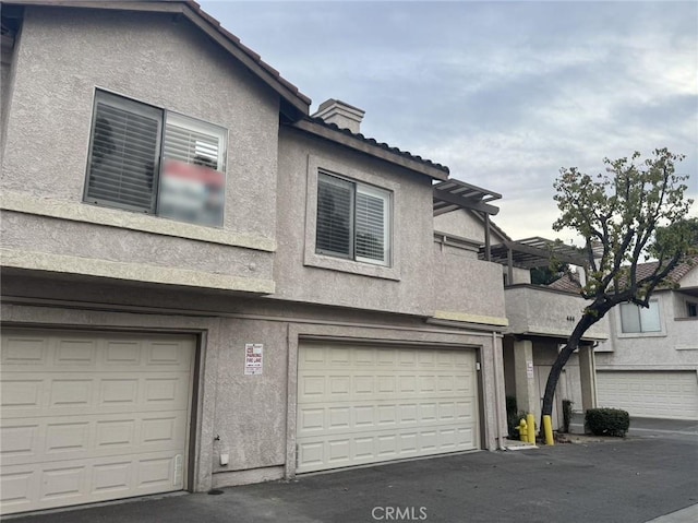 exterior space with a garage