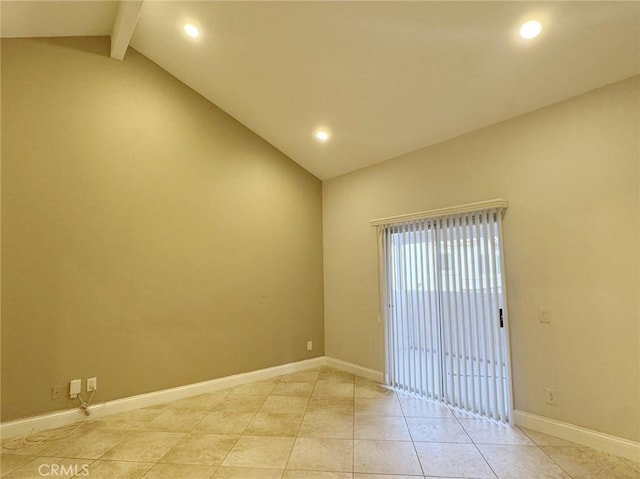 tiled spare room with lofted ceiling with beams