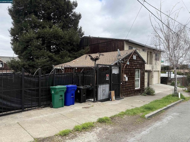 view of property exterior with a garage