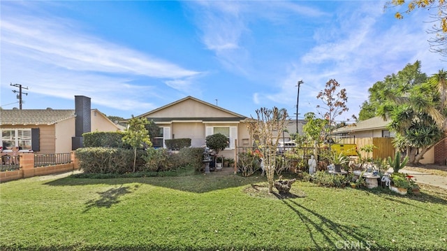 view of front of property with a front yard