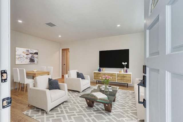 living room featuring light hardwood / wood-style flooring