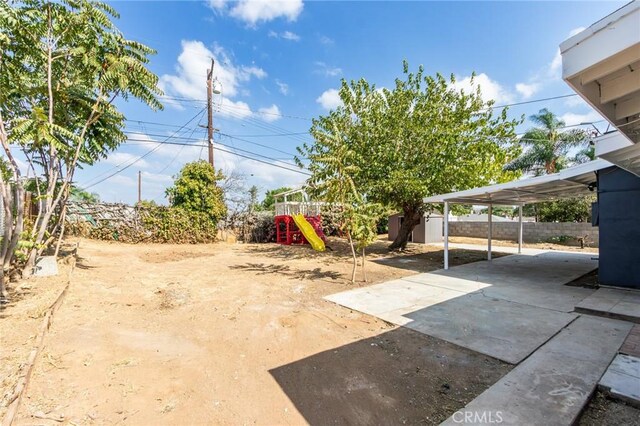 view of yard featuring a playground