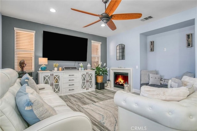 living room with ceiling fan