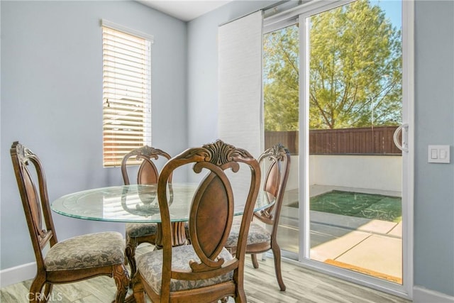 dining room featuring light hardwood / wood-style flooring