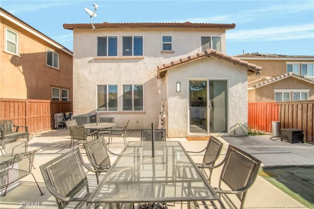 rear view of house with a patio area