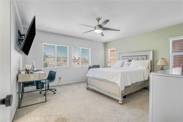 bedroom with light carpet and ceiling fan