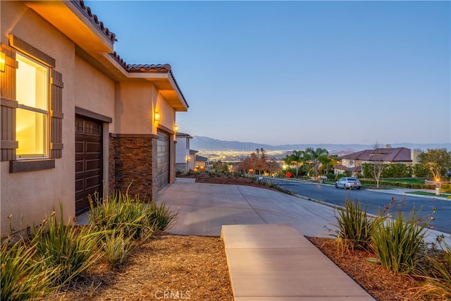 exterior space featuring a mountain view