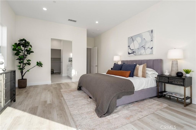 bedroom featuring light hardwood / wood-style flooring