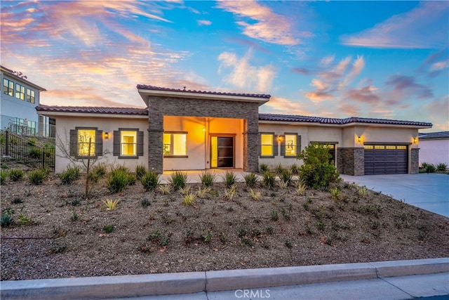 view of front of home featuring a garage