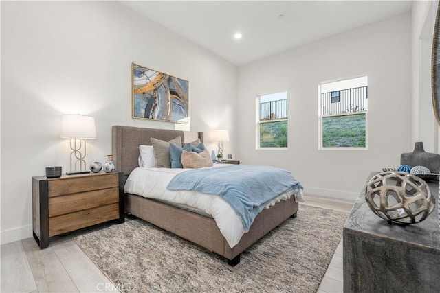 bedroom with light hardwood / wood-style flooring