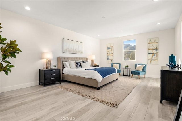 bedroom with light hardwood / wood-style floors