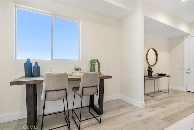 dining room with light hardwood / wood-style flooring