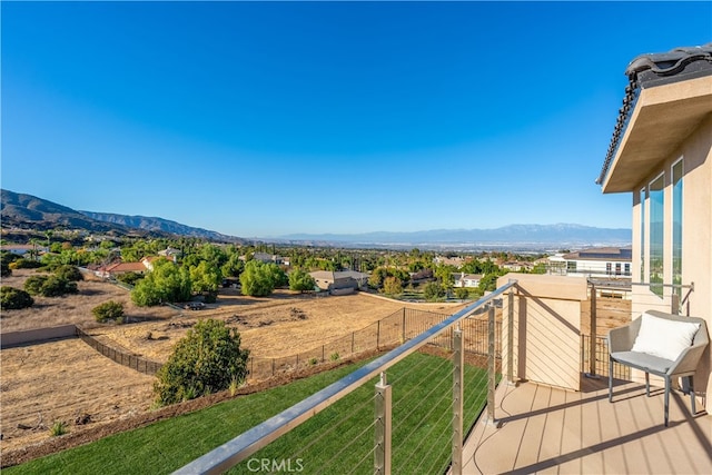 balcony featuring a mountain view