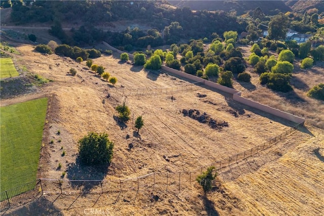 birds eye view of property featuring a rural view