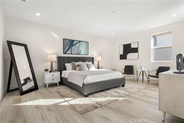 bedroom with light hardwood / wood-style floors