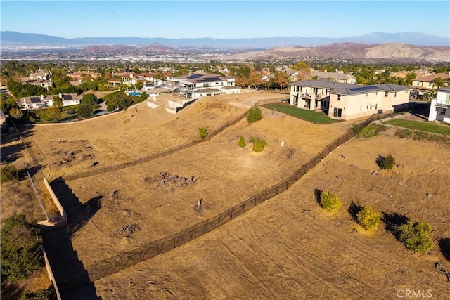 drone / aerial view featuring a mountain view