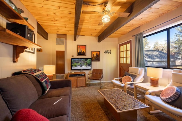 carpeted living room featuring ceiling fan, wood ceiling, and beamed ceiling