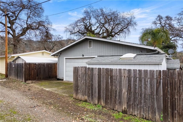 view of home's exterior with a garage