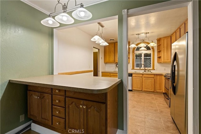 kitchen featuring light tile patterned floors, stainless steel appliances, pendant lighting, and kitchen peninsula