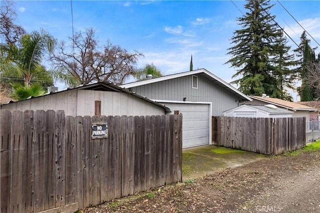 view of property exterior featuring a garage