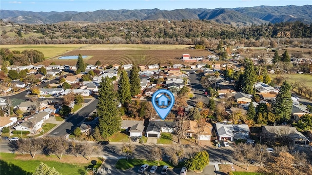 drone / aerial view featuring a mountain view