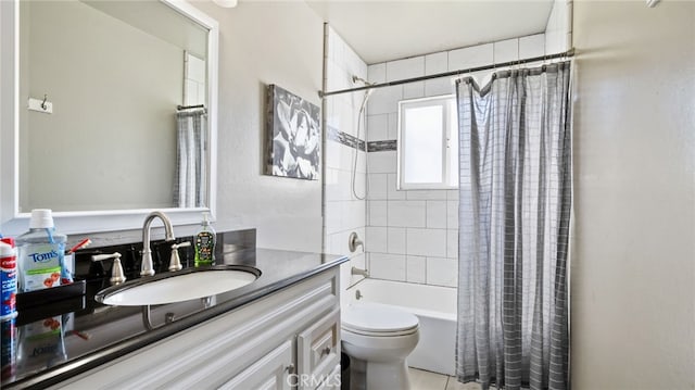 full bathroom with toilet, vanity, and shower / bath combo