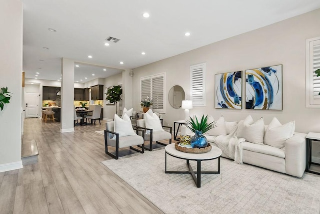 living room featuring light wood-type flooring