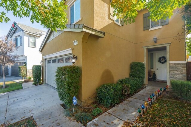 property entrance with a garage