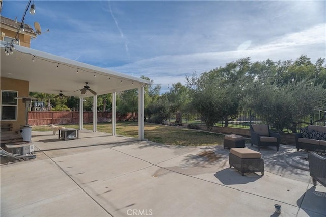 view of patio with ceiling fan and central AC unit