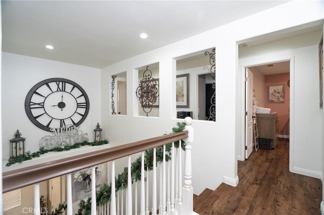 corridor featuring dark hardwood / wood-style flooring