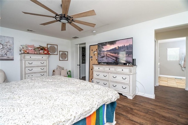 bedroom with dark wood-type flooring and ceiling fan