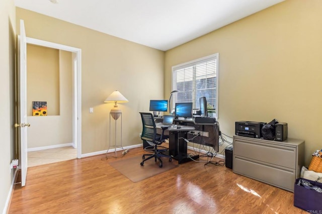 office space with hardwood / wood-style flooring