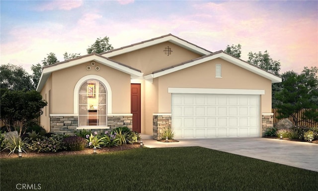 ranch-style home featuring a yard and a garage