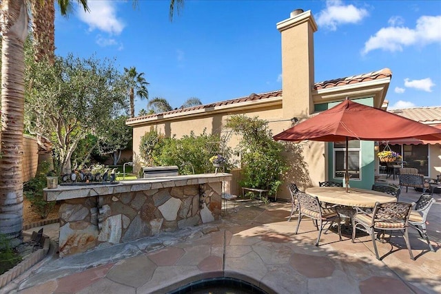 view of patio / terrace featuring a bar