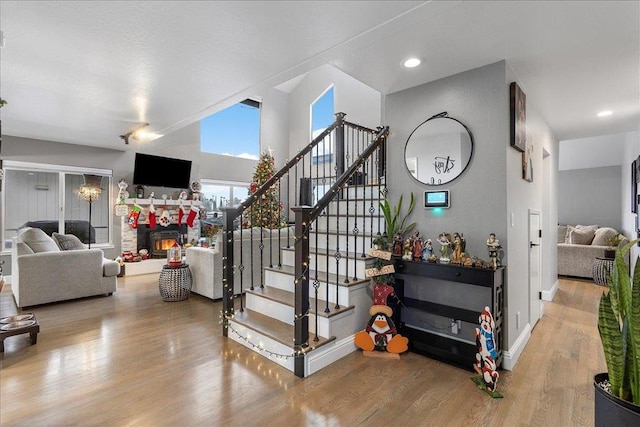 staircase with wood-type flooring