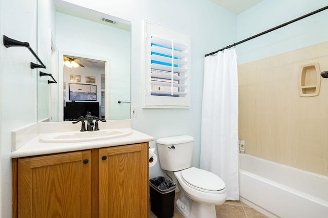 full bathroom with toilet, vanity, ceiling fan, shower / bath combo, and tile patterned floors