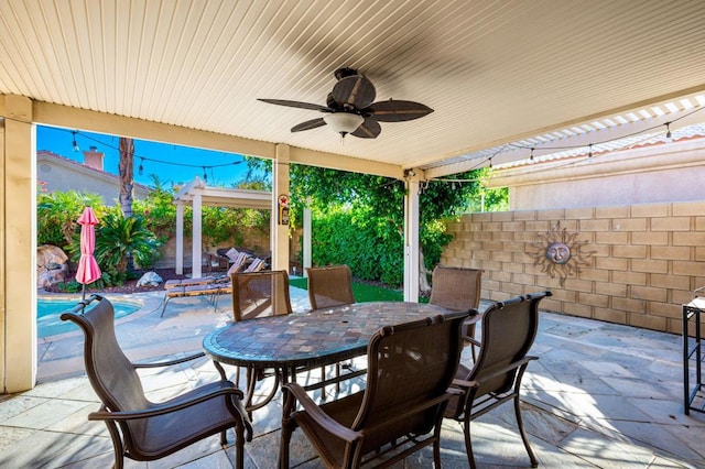 view of patio with ceiling fan