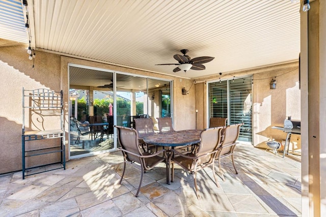 view of patio / terrace featuring ceiling fan