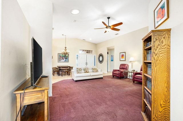 living room with lofted ceiling, ceiling fan, and carpet floors