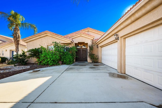 view of front of home featuring a garage