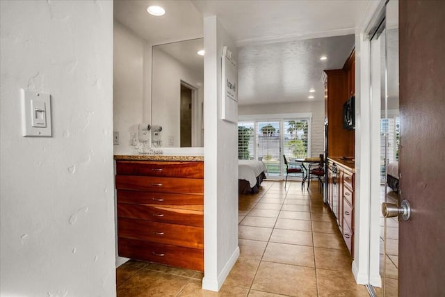 bathroom featuring vanity and tile patterned flooring