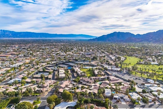 birds eye view of property featuring a mountain view